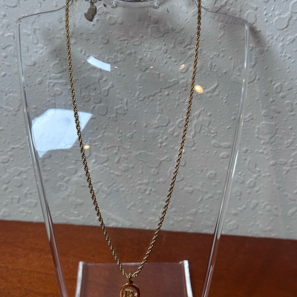 Auth Christian Dior Necklace
Vertical Oval Signature